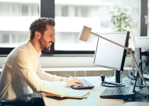 Man enjoying RPA on his computer