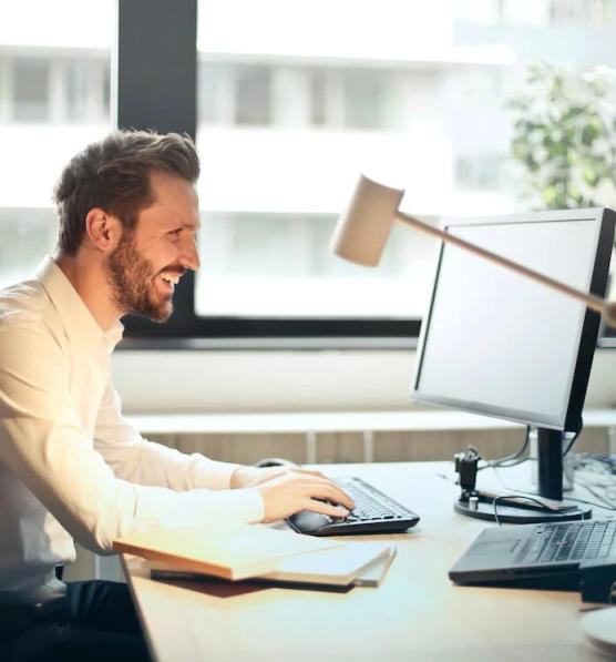 Man enjoying RPA on his computer